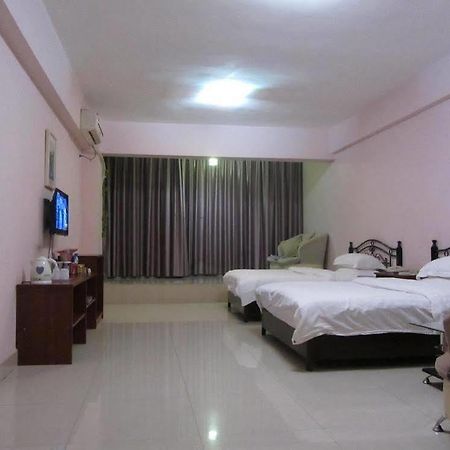 Taohuayuan Apartment Hotel Наньнин Экстерьер фото