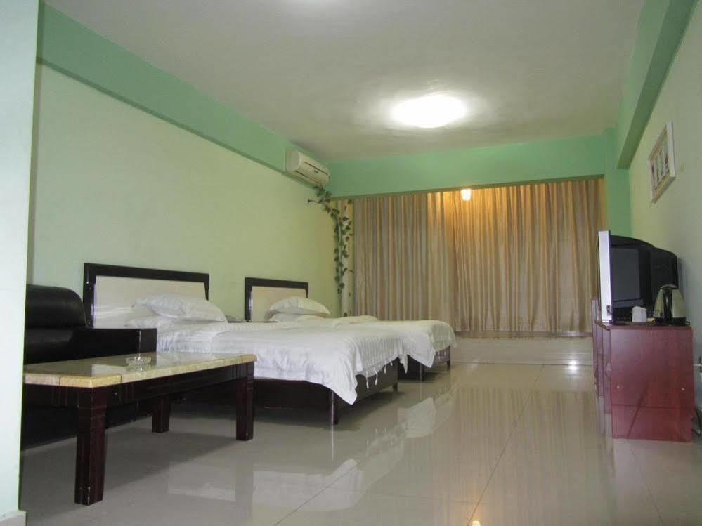 Taohuayuan Apartment Hotel Наньнин Экстерьер фото