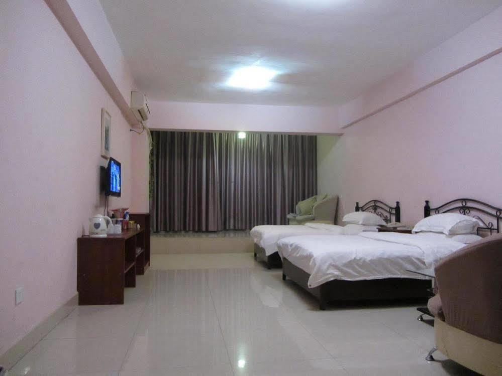 Taohuayuan Apartment Hotel Наньнин Экстерьер фото